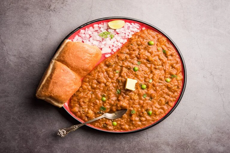 mumbai-style-pav-bhaji-is-fast-food-dish-from-india-consists-thick-vegetable-curry-served-with-soft-bread-roll-served-plate